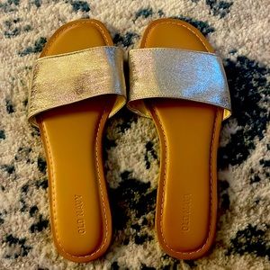 Tan and gold sandals